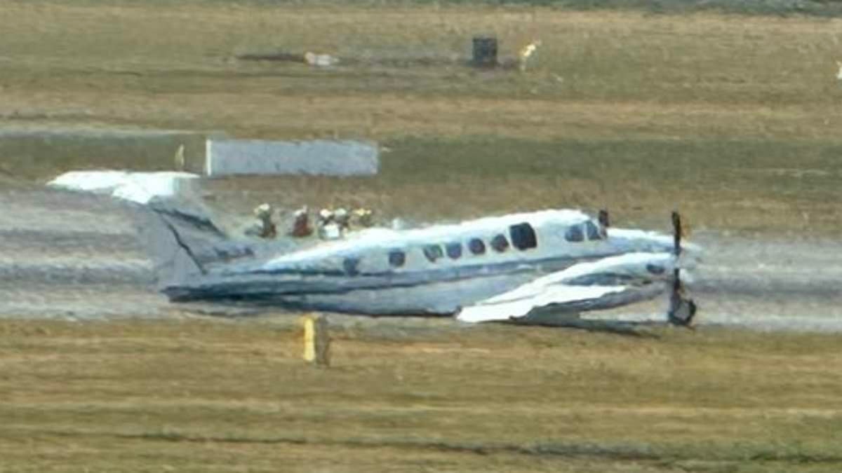 Moment private plane makes emergency landing at Birmingham Airport causing chaos for thousands: Families are left in tears with summer holidays ruined as ALL flights grounded for hours