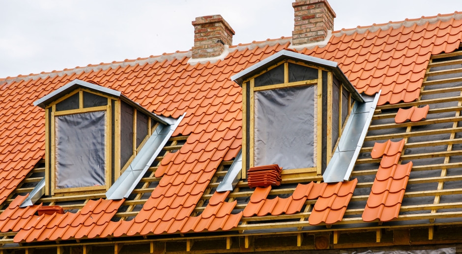 A controversial way to pay taxes. They're tearing down the roof to avoid paying.