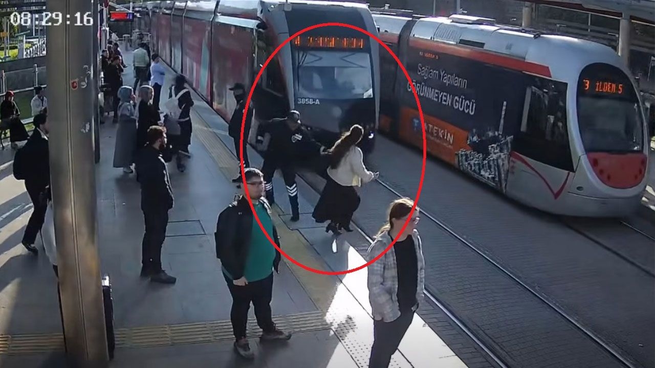Disaster averted! Security guard rescues man from being run over by tram