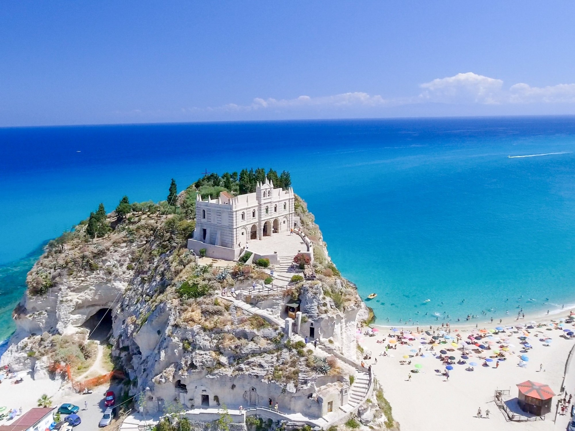 Turquoise waters, whitewashed houses, and great food: 8 idyllic Mediterranean beaches, including "the best in the world in 2025."